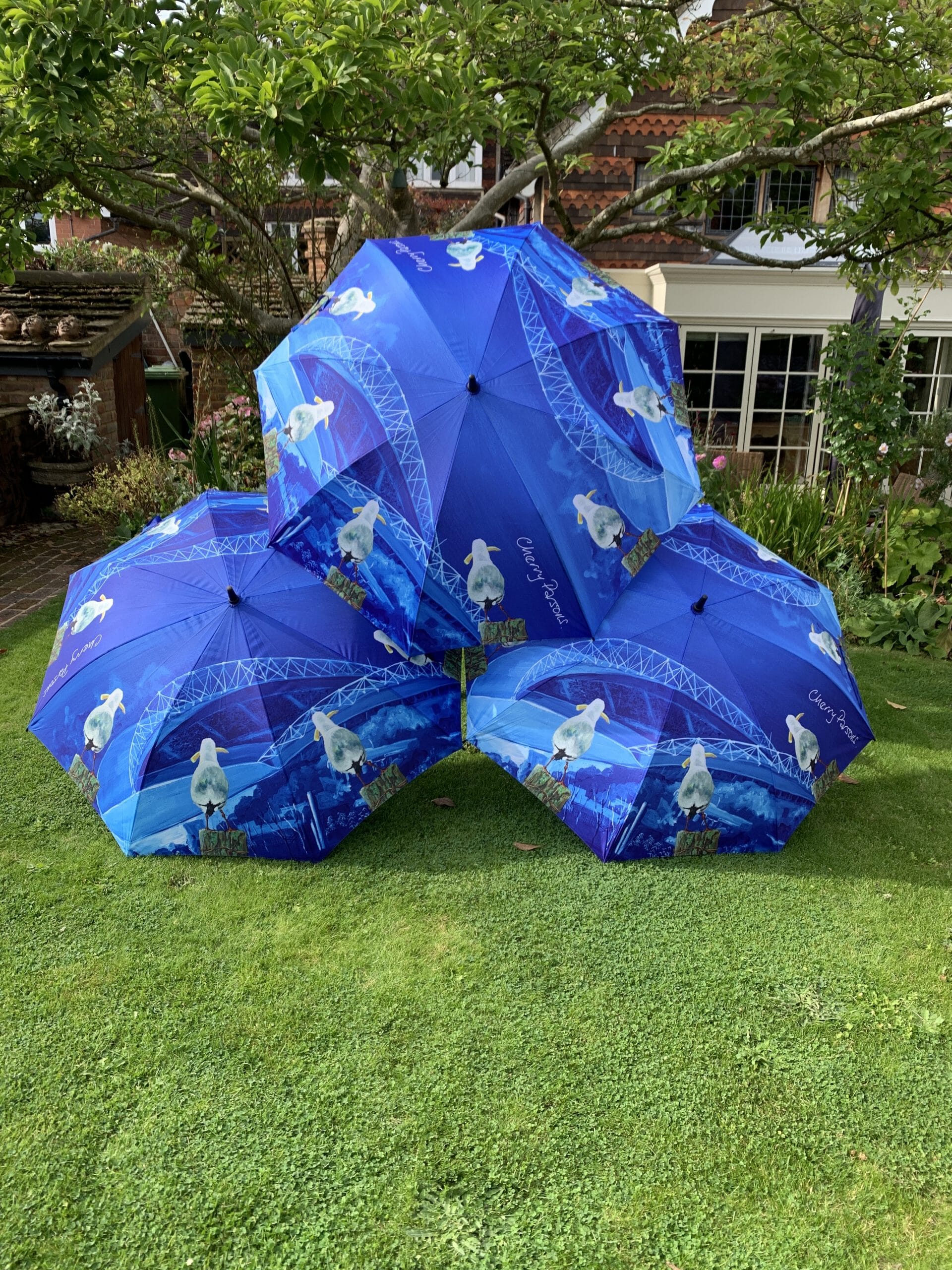 Blue Seagull Golf Umbrella of Seagulls watching Brighton football stadium